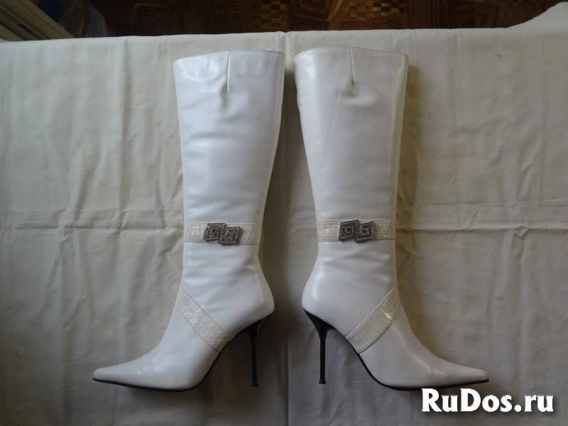 Новые зимние женские сапоги на шпильках фото