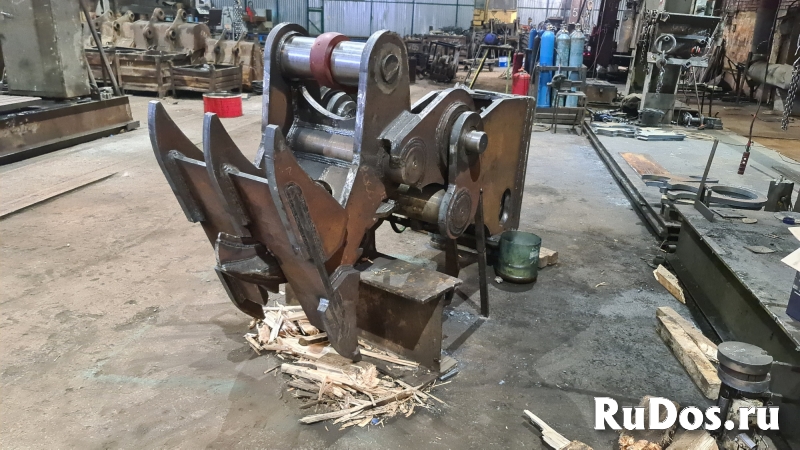 На экскаватор корчеватель-расщепитель для пней фото