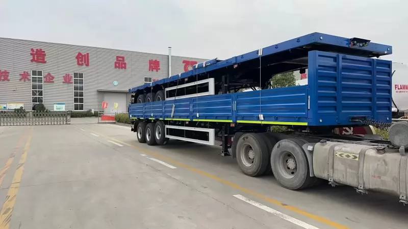 Полуприцеп с бортовой платформой TONGYADA CTY9603LBD 3-оси, грузоподъёмностью 50 тонн, с фитингами под контейнер, новый 2025 г.в фотка