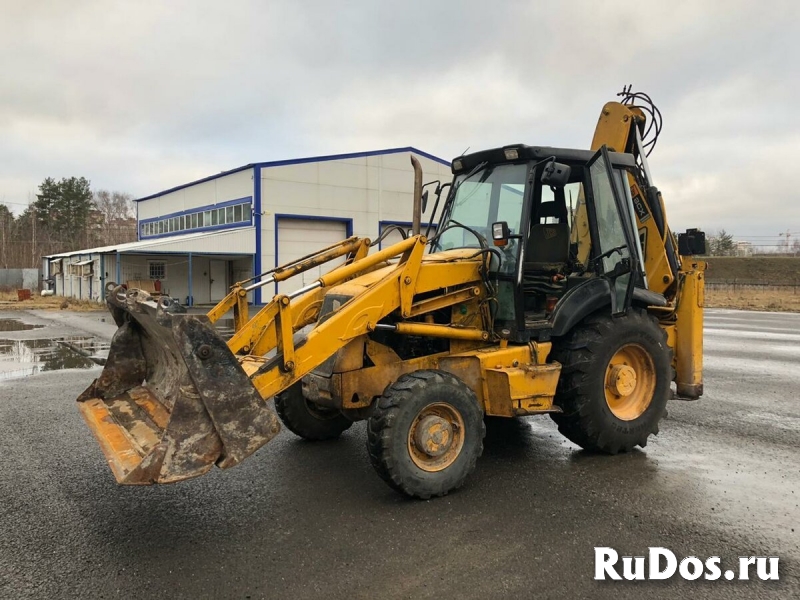 Услуги экскаватора погрузчика фото