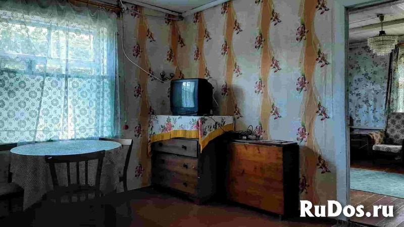 Бревенчатый дом на участке 1 гектар рядом с красивым озером изображение 6