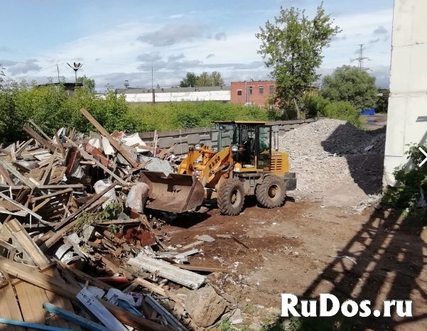 Экскаватор колёсный - погрузчик  Аренда экскаватора-погрузчика фото