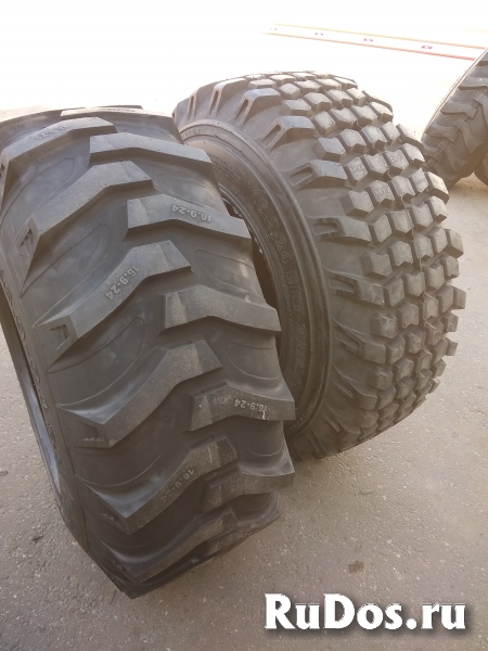 Шины 18.4-26, 12.5/80-18 на экскаватор New Holland (Нью Холланд) изображение 3