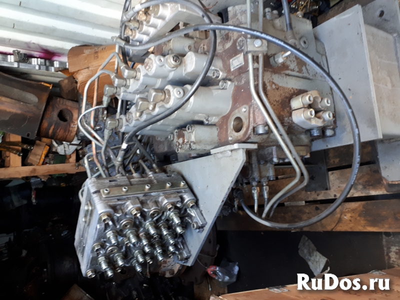 Гидрораспределитель 4632973 4661709 4691384 4691477 фото