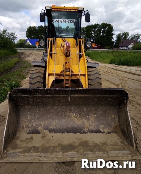 Услуги фронтального погрузчика 1.7 м3 фото