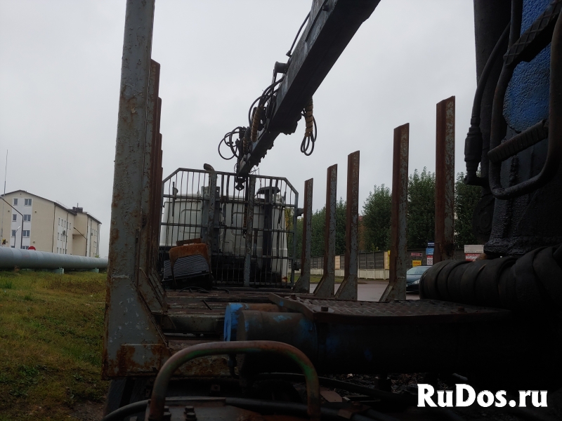 Лесовоз МАЗ 6303А8 1328 с гидроманипулятором фото