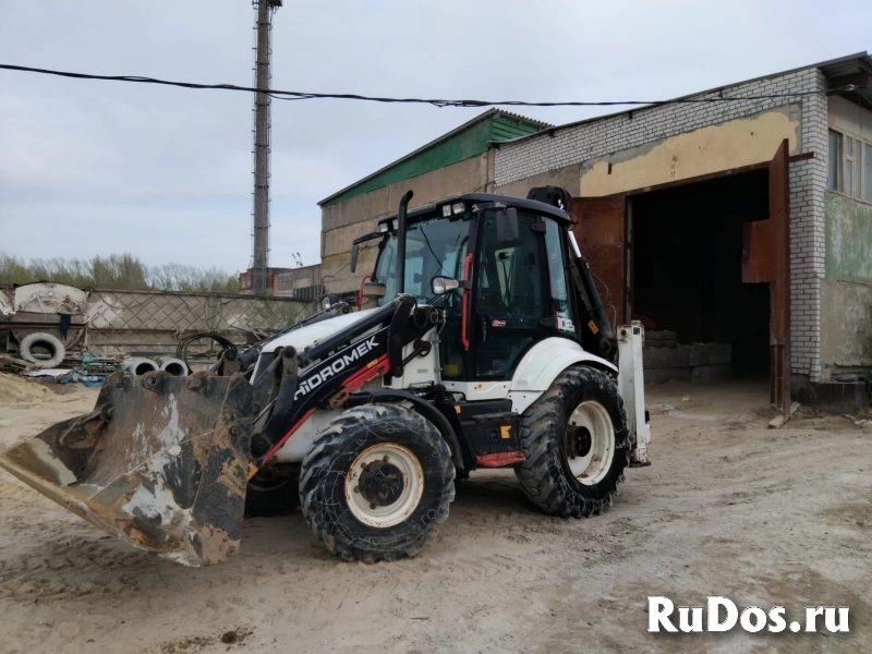 Предлагаем услуги экскаватора-погрузчика фотка
