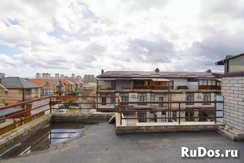 Трёхэтажный дом с террасой и красивым видом в развитом районе Краснодара изображение 7