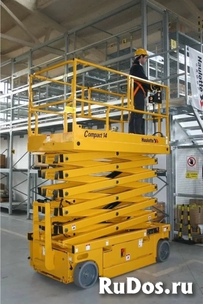 Вертикальный ножничный подъемник Сомпакт 12, 14 - Аренда фото