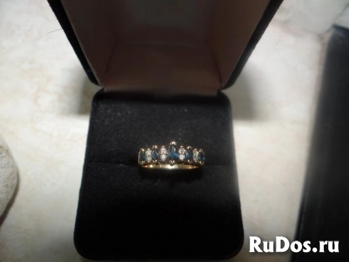 Ювелирный гврнитур из трех предметов (кольцо, серьги и колье) изображение 5