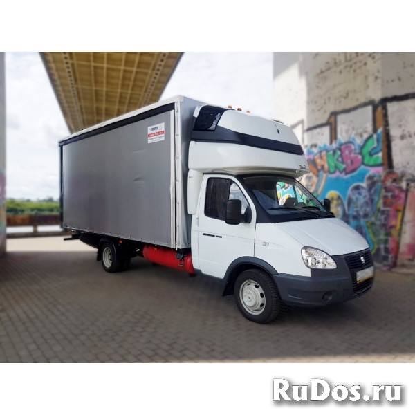 Грузоперевозки Газель с грузчиками по городу фото