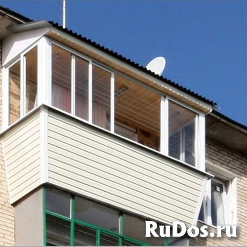 Установка рам балконов и лоджий. Утепление и обшивка. фото