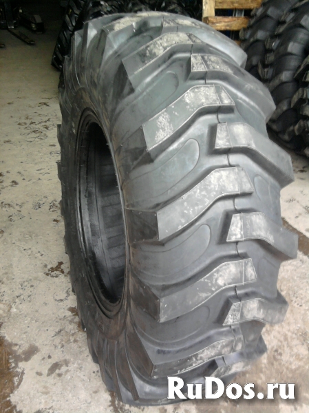 Шины 16.9-28 R4 экскаватора-погрузчика фото