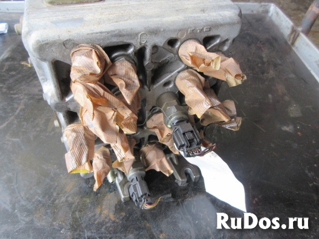 Пилотный гидрораспределитель 4634207 фото