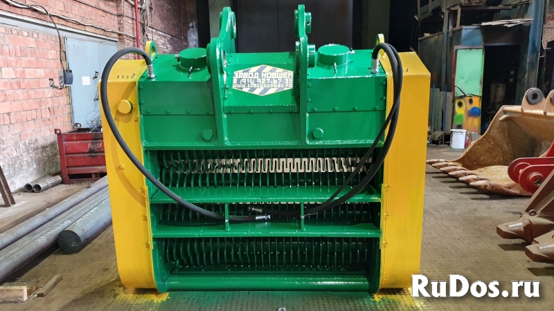 В наличии компактный просеивающий ковш валковый фото