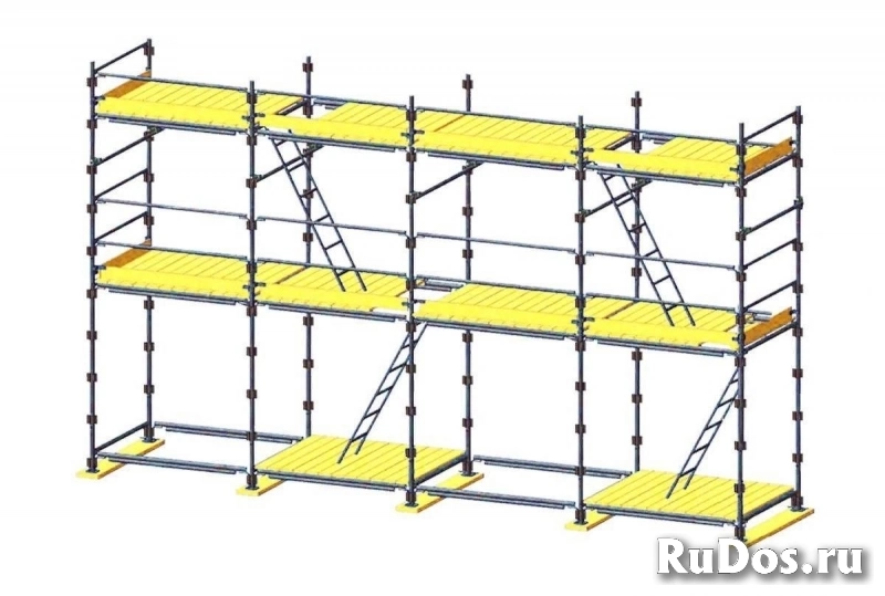 Аренда фасадных строительных лесов фото