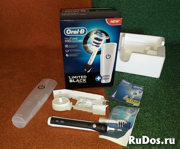 Электрическая зубная щетка Braun Oral-B TriZone 70 фото