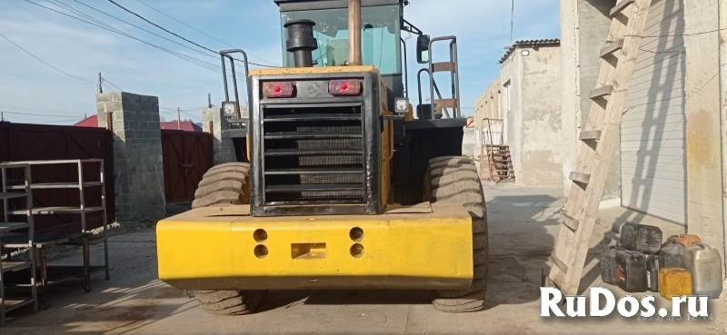 Продается фронтальный погрузчик фотка