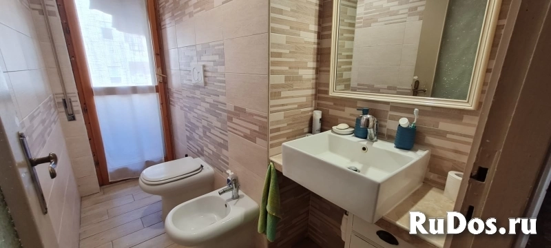 Квартира на морском курорте Неттуно в Италии изображение 4