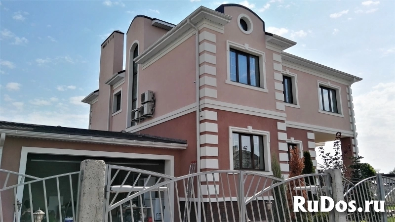 Отделка фасада с помощью декоративной штукатурки фото