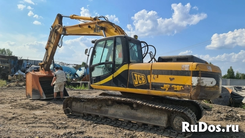Просеивающий валково-дробильный ковш на складе изображение 5