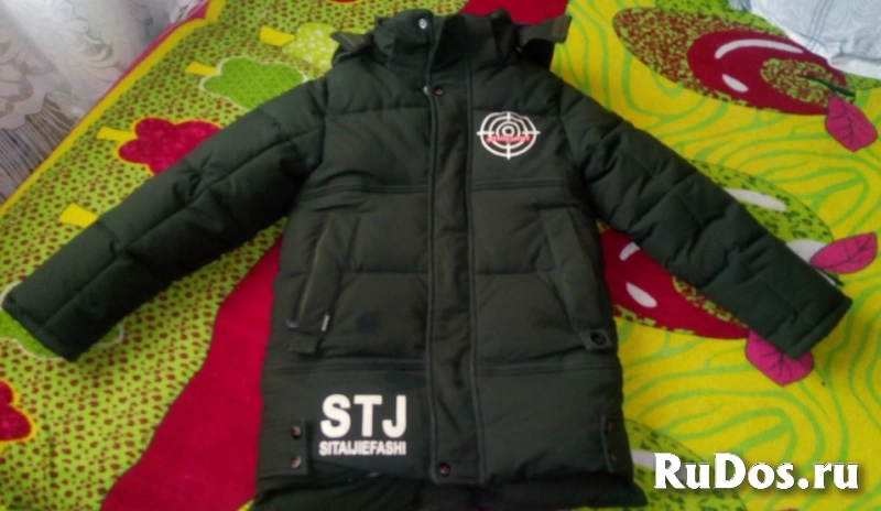 Пуховик детский на мальчика от 8 до 10 лет состояние нового фото