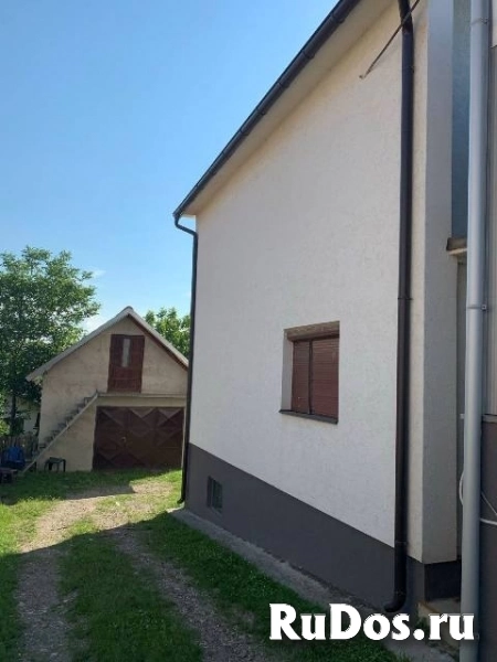 Коммерческое здание и дом изображение 4