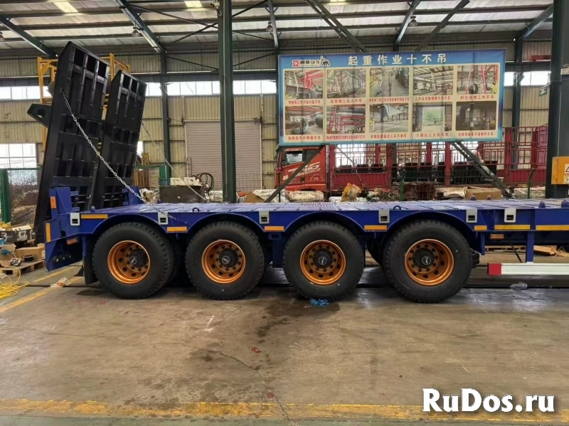 Полуприцеп-трал с трапами TONGYADA CTY9804TDPS 4-оси, грузоподъёмностью 65 тонн изображение 4